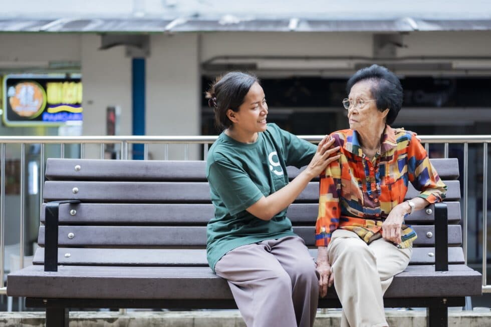 Domestic helper providing hands-on elderly care